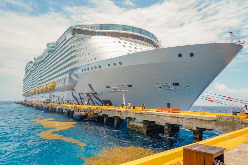 wonder of the seas ship docked on a cloudy day