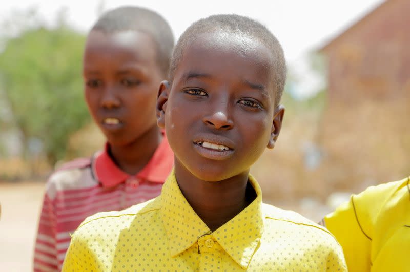 Bashir Nur Salat poses for a photograph at the Kabasa Primary School, in Dollow