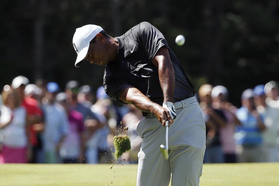 Tiger Woods hits from the fairway on the fifth hole during the third round of the Dell Technologies Championship golf tournament at TPC Boston in Norton, Mass., Sunday, Sept. 2, 2018. (AP Photo/Michael Dwyer)