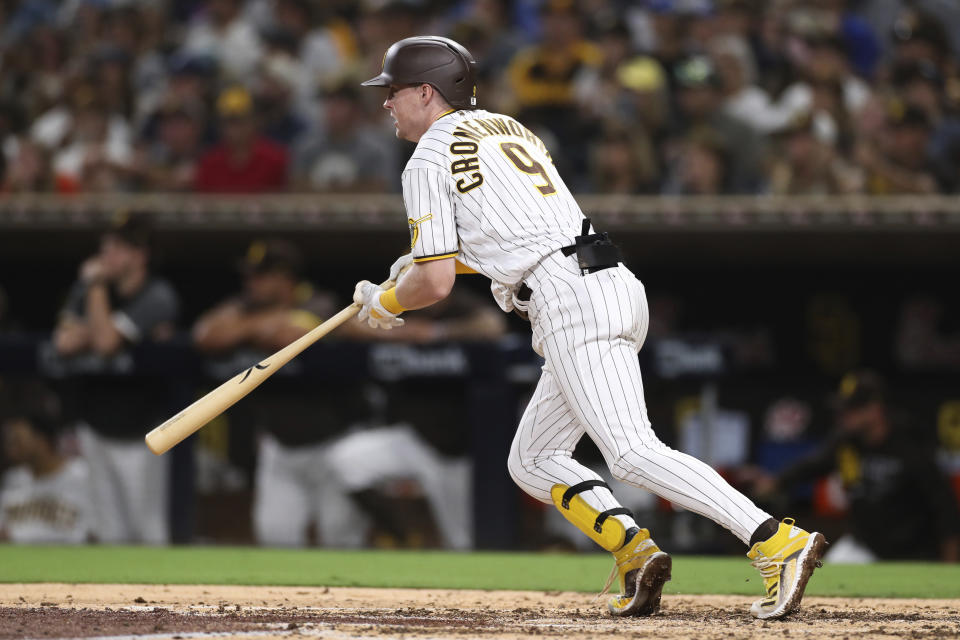 San Diego Padres' Jake Cronenworth watch his RBI single against the Oakland Athletics during the fifth inning of a baseball game Tuesday, July 27, 2021, in San Diego. (AP Photo/Derrick Tuskan)