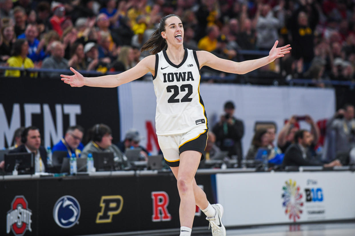 Caitlin Clark and the Iowa Hawkeyes rallied back to beat Nebraska in overtime and win the Big Ten tournament on Sunday. (Aaron J. Thornton/Getty Images)