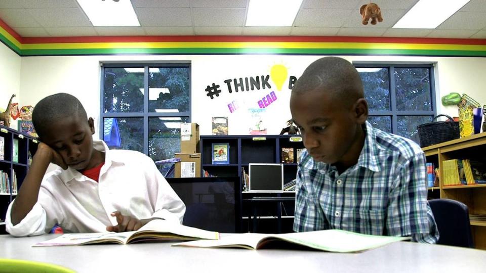 This photo shows two students who were able to attend a Charlotte charter school with help from North Carolina’s Opportunity Scholarship voucher program. Republican lawmakers are working to expand voucher eligibility to families all of incomes and to sharply boosts funding for the program.