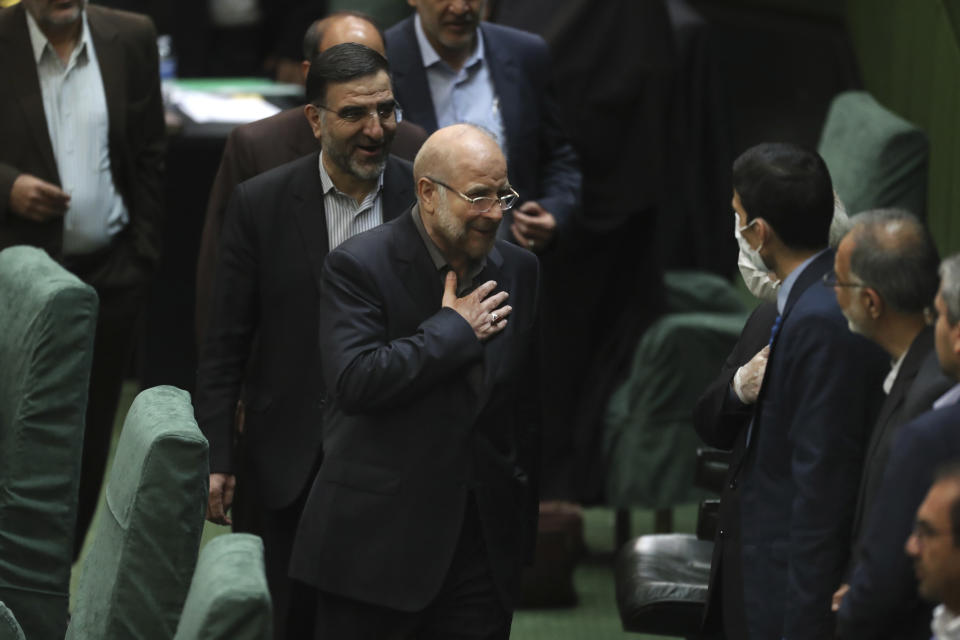 Mohammad Bagher Qalibaf, center, greets lawmakers after being elected as speaker of the parliament, in Tehran, Iran, Thursday, May 28, 2020. Iran's parliament elected Qalibaf, a former mayor of Tehran tied to the Revolutionary Guard, as its next speaker Thursday, solidifying hard-line control of the body as tensions between the U.S. and the Islamic Republic remain high over its collapsed nuclear deal. (AP Photo/Vahid Salemi)