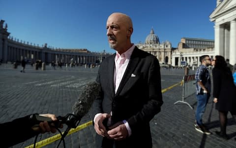 Peter Isely, founding member of Ending Clergy Abuse, in St. Peter's Square at the Vatican - Credit: Gregorio Borgia/AP