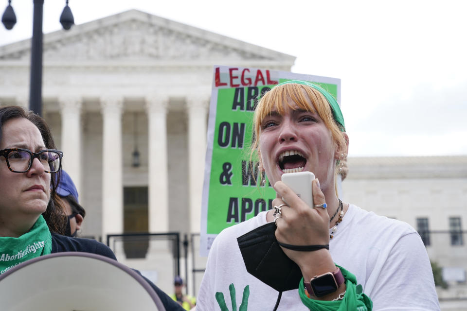 A tear rolls down an abortion-rights activist's cheek as they speak outside the Supreme Court in Washington, Friday, June 24, 2022. The Supreme Court has ended constitutional protections for abortion that had been in place nearly 50 years in a decision by its conservative majority to overturn Roe v. Wade. (AP Photo/Jacquelyn Martin)