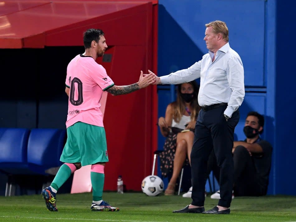 Ronald Koeman shakes hands with Lionel MessiGetty