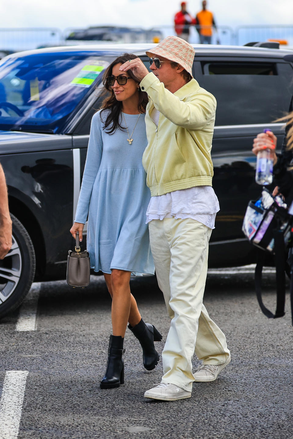 NORTHAMPTON, ENGLAND - JULY 7: Brad Pitt, star of upcoming 'F1' movie, arrives in the paddock with girlfriend Ines de Ramon during the F1 Grand Prix of Great Britain at Silverstone Circuit on July 7, 2024 in Northampton, United Kingdom. (Photo by Kym Illman/Getty Images)