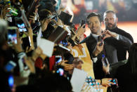 <p>Australian actor Hugh Jackman cheers with fans during a media event promoting his American superhero film ” Logan” in Taipei, Taiwan, Monday, Feb. 27, 2017. (AP Photo/Chiang Ying-ying) </p>