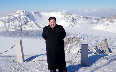 North Korean leader Kim Jong-Un visiting Mount Paektu in Ryanggang Province - Credit:  AFP