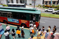 <p>Tourists ride a bus in the Tumon tourist district on the island of Guam, a U.S. Pacific Territory, August 10, 2017. (Erik De Castro/Reuters) </p>