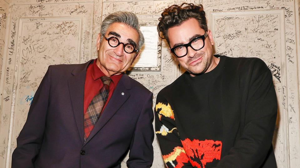 Eugene Levy and Dan Levy are seen during the "Best Wishes, Warmest Regards" book launch at The Beacon Theatre on October 25, 2021 in New York City