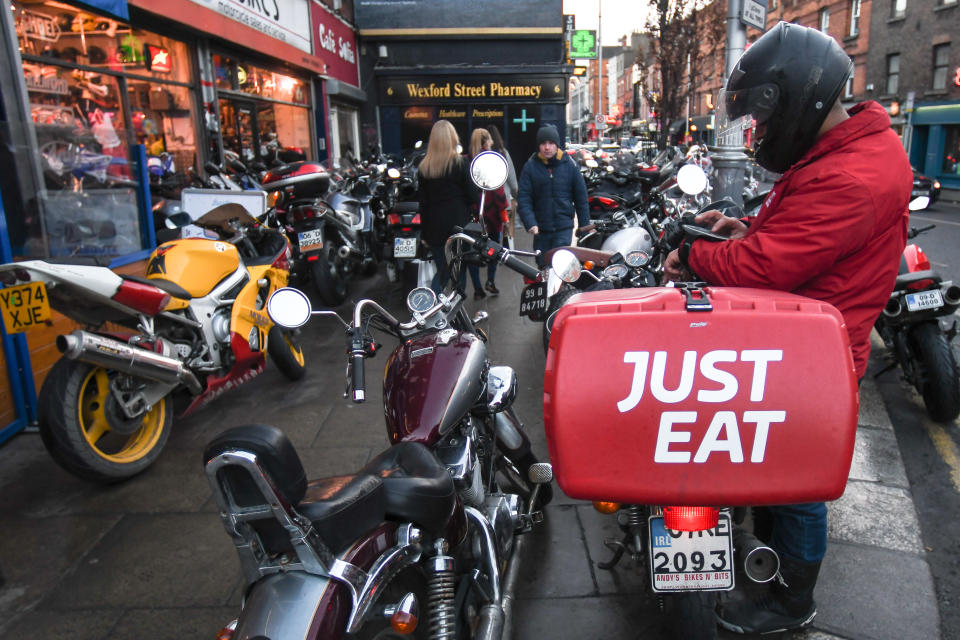 A staff of takeaway food online 'Just Eat'  seen on Camden Street in Dublin. On Saturday, 14 January 2017, Dublin, Ireland. (Photo by Artur Widak/NurPhoto via Getty Images)