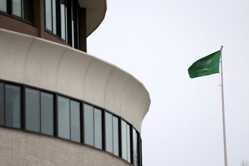 The flag of Saudi Arabia flies above the Saudi Arabia embassy near the Watergate Complex in Washington