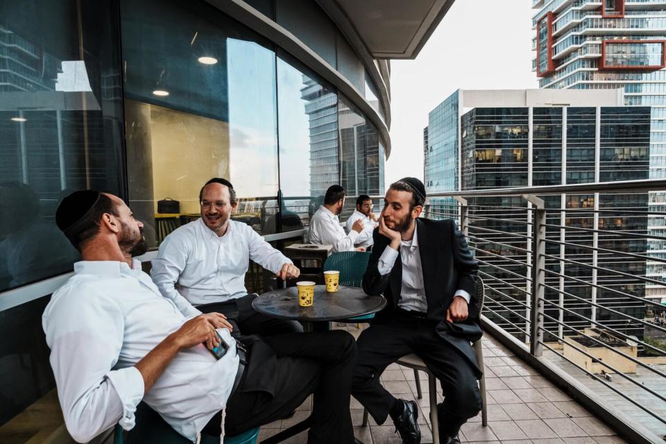 Students from Orthodox Jewish communities take a break in between classes where they learn how to code and program at JBH.