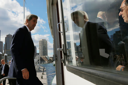 U.S. Secretary of State John Kerry boards a boat for a cruise through Boston harbor with British Foreign Secretary Boris Johnson, European Union High Representative Federica Mogherini, French Foreign Minister Jean-Marc Ayrault, German Foreign Minister Frank-Walter Steinmeier, Italian Foreign Minister Paolo Gentiloni in Boston, Massachusetts, U.S. September 24, 2016. REUTERS/Brian Snyder