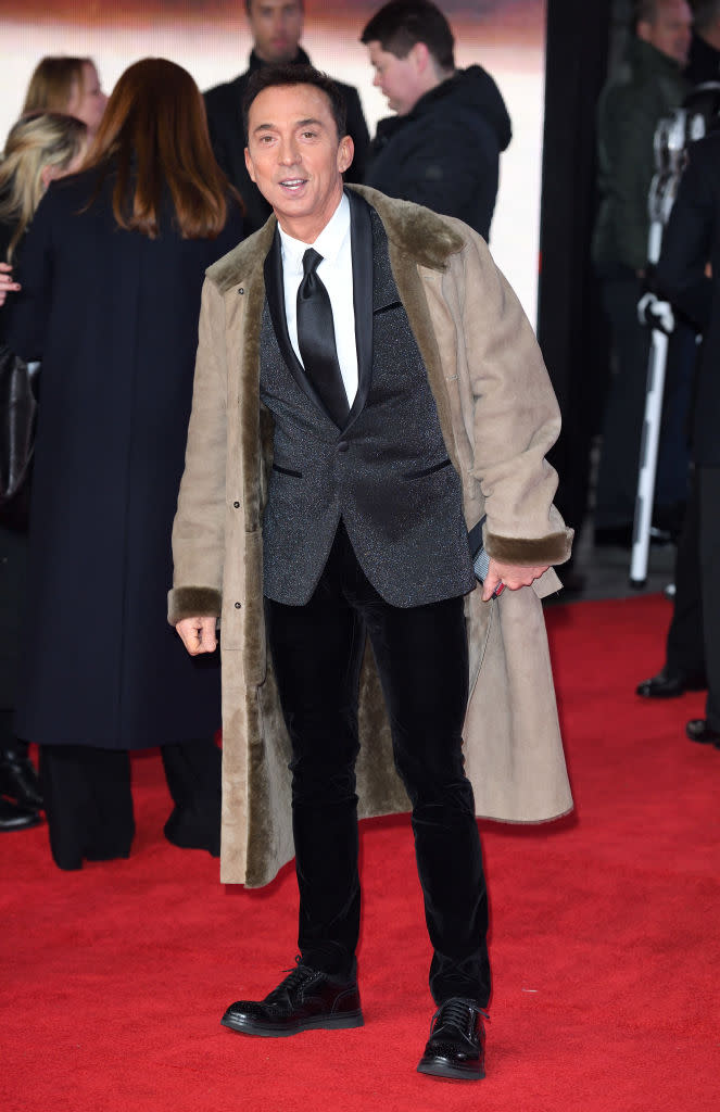 <p>The British television personality cozied up in a heavy taupe coat over a sparkling suit at the European premiere of <em>Star Wars: The Last Jedi</em>. (Photo: Getty Images) </p>