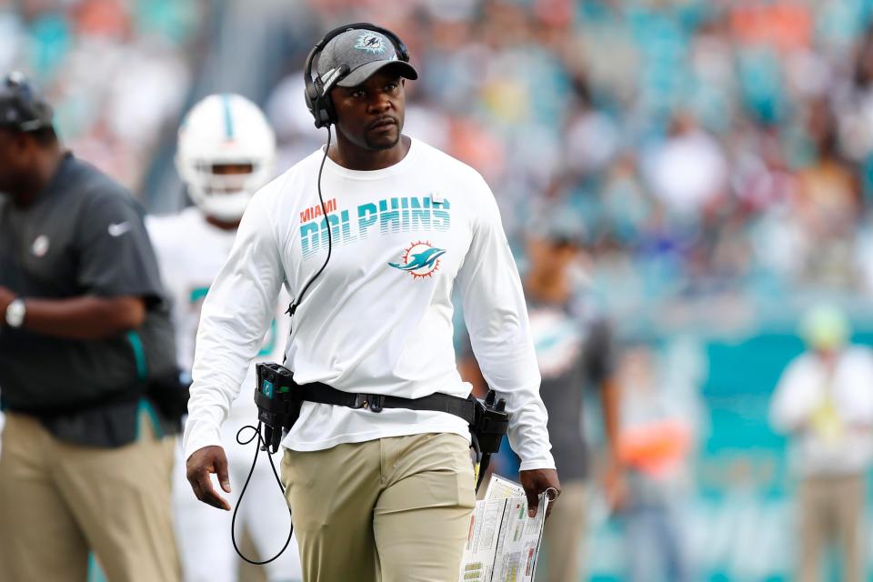 Miami Dolphins head coach Brian Flores follows a play, during the second half at an NFL football game against the Washington Redskins, Sunday, Oct. 13, 2019, in Miami Gardens, Fla. (AP Photo/Brynn Anderson)