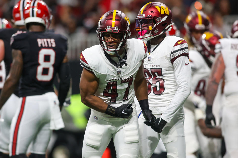 Oct 15, 2023; Atlanta, Georgia, USA; Washington Commanders linebacker Khaleke Hudson (47) reacts after a tackle against the Atlanta Falcons in the second half at Mercedes-Benz Stadium. Mandatory Credit: Brett Davis-USA TODAY Sports