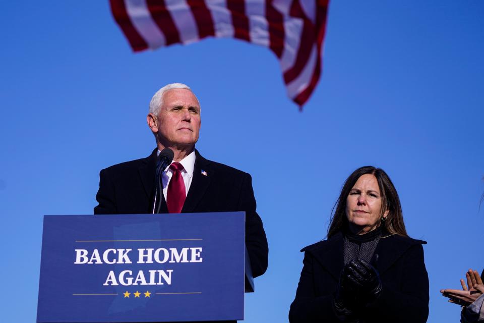 Ex-US vice president, pictured with his wife Karen after returning to Indiana on 20 January, remains estranged from Donald TrumpAP