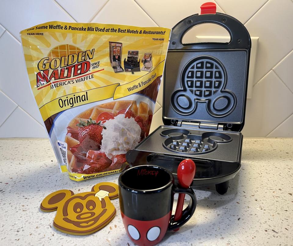 With a bag of Golden Malted waffle and pancake mix and a Mickey Mouse waffle iron, I went to work testing whether or not you can make Mickey waffles at home. (Photo: Carly Caramanna)