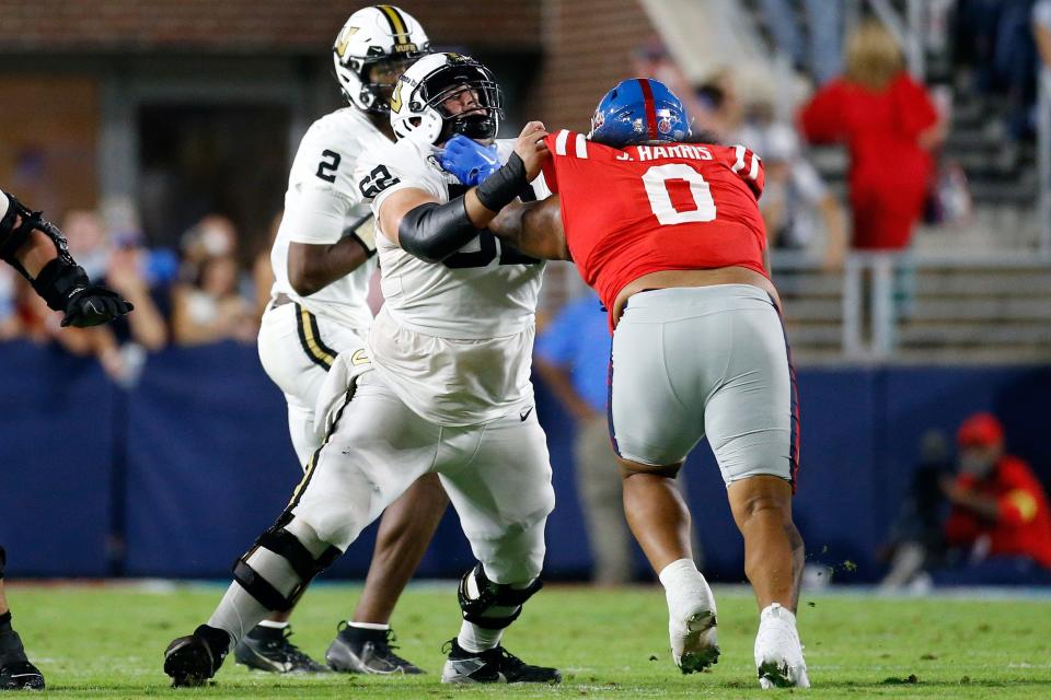 Vanderbilt Commodores offensive linemen Julian Hernandez (62) blocks Mississippi Rebels defensive linemen Joshua Harris (0) during the first half at Vaught-Hemingway Stadium on Oct 28, 2023, in Oxford, Mississippi.