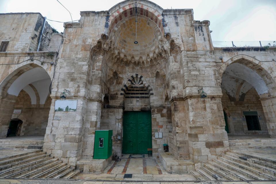 A picture shows the closed doors of Al-Aqsa mosque in Jerusalem's Old City, after clerics shut the doors of the mosque and the Dome of the Rock, in a bid to stem the spread of the novel coronavirus, on March 20, 2020. (Photo by AHMAD GHARABLI / AFP) (Photo by AHMAD GHARABLI/AFP via Getty Images)