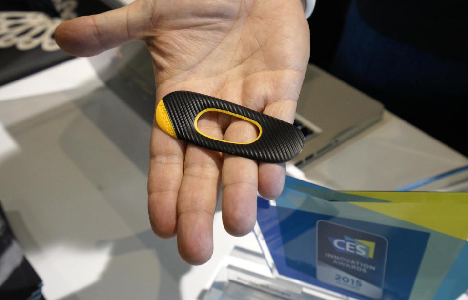 The FitLinxx AmpStrip wearable heartrate monitor is displayed at the International Consumer Electronics show (CES) in Las Vegas, Nevada January 4, 2015. The AmpStrip is designed to be comfortable enough to be worn 24/7 for constant monitoring. REUTERS/Rick Wilking