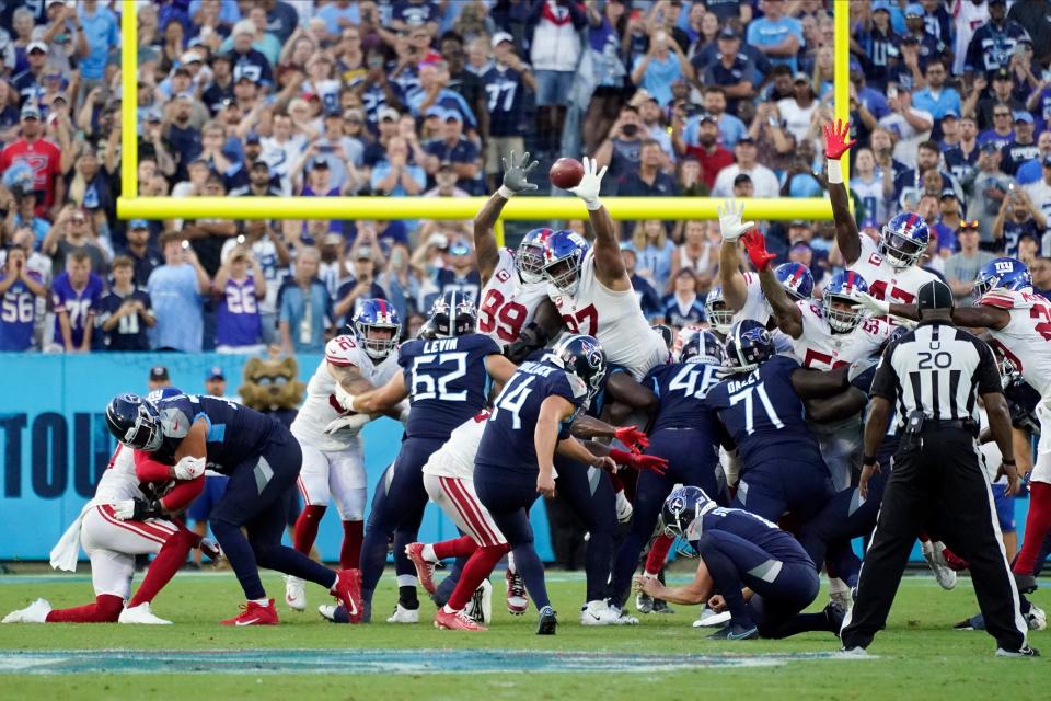 Tennessee Titans place kicker Randy Bullock (14) misses a field goal during the second half of an NFL football game against the New York Giants Sunday, Sept. 11, 2022, in Nashville. The Giants won 21-20.(AP Photo/Mark Humphrey)