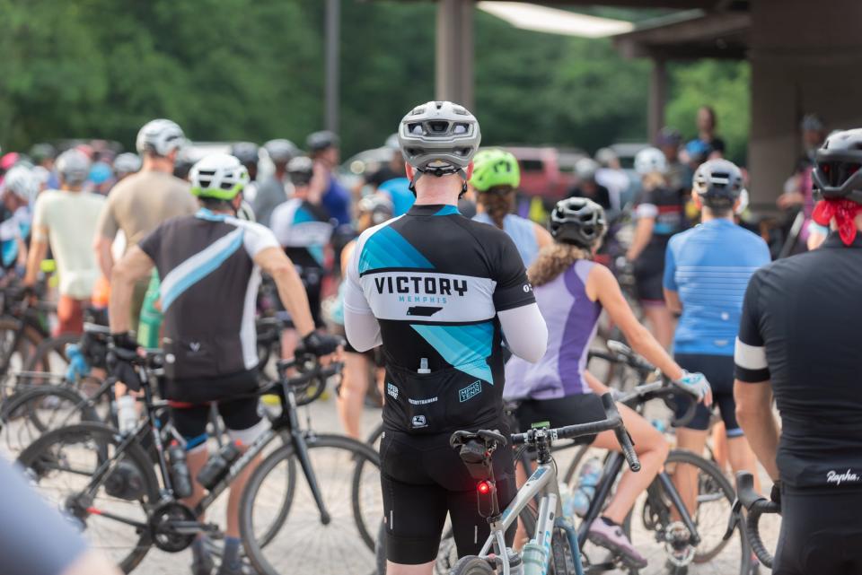 Clark Butcher, Victory Bicycle Studio owner, waits for a group ride to begin. "The biggest group rides when I began training would maybe have 30 people," Butcher says. "Now, there will be three to four group rides across the city, all with anywhere from 30 to 80 people.