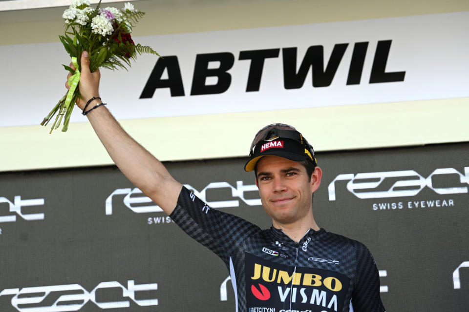 ABTWILL SWITZERLAND  JUNE 18 Wout Van Aert of Belgium and Team JumboVisma  Black Points Jersey celebrates at podium during the 86th Tour de Suisse 2023 Stage 8 a 257km individual time trial from St Gallen to Abtwil  UCIWT  on June 18 2023 in Abtwil Switzerland Photo by Tim de WaeleGetty Images