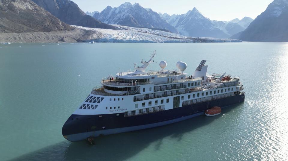 A view of the Ocean Explorer, a Bahamas-flagged Norwegian cruise ship with 206 passengers and crew, which has run aground in northwestern Greenland is pictured on Tuesday, Sept. 12, 2023. The 104.4-meter (343-foot) long and 18-meter (60 foot) wide Ocean Explorer ran aground on Monday in Alpefjord in the Northeast Greenland National Park. Another attempt to pull free a luxury cruise ship with 206 people that ran aground in the world’s northernmost national park has failed by using the high tide. It was the third attempt to free the MV Ocean Explorer. (SIRIUS/Joint Arctic Command via AP)