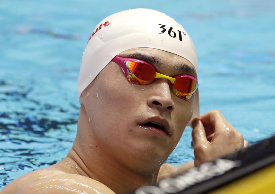 China's Sun Yang takes a break during a training session at the World Swimming Championships in Gwangju, South Korea, Friday, July 19, 2019. (AP Photo/Lee Jin-man)