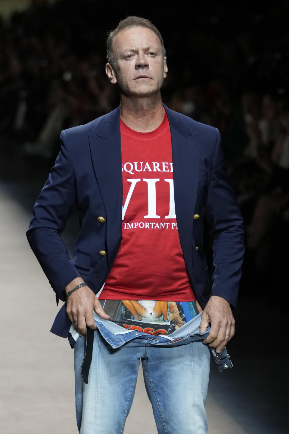 Italia movie director Rocco Siffredi wears a creation as part of the Dsquared2 men's Spring Summer 2024 collection presented in Milan, Italy, Friday, June 16, 2023. (AP Photo/Luca Bruno)