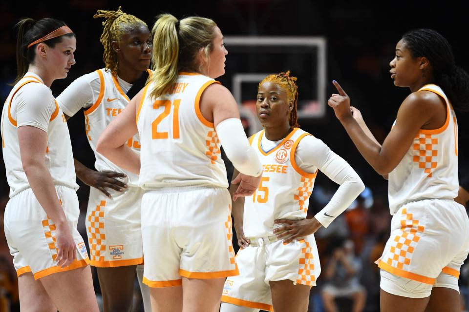 From left, Tennessee's Sara Puckett (1), Jillian Hollingshead (53), Tess Darby (21), Jasmine Powell (15), and Jewel Spear (0) talk during a break in the NCAA college basketball game against Memphis on Monday, November 13, 2023 in Knoxville, Tenn.