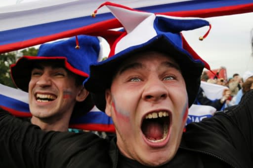 Russian fans celebrate as they watch their team take on Saudi Arabia at the World Cup