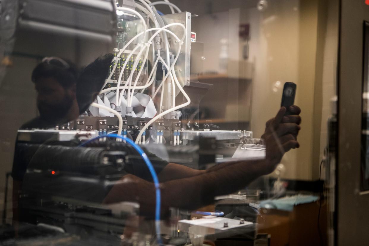 A massive ceramic 3d printer has been set up at the University of Delaware with the hopes of creating a ceramic lens that they hope will become a key component in the advancement in high speed 5G internet. 