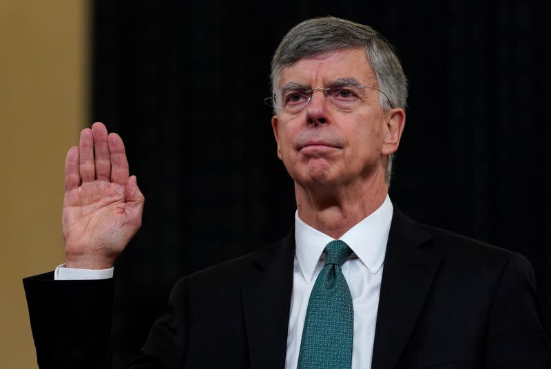 FILE PHOTO: Ambassador Bill Taylor sworn in to testify as House Intelligence Committee holds hearing on Trump impeachment inquiry on Capitol Hill in Washington