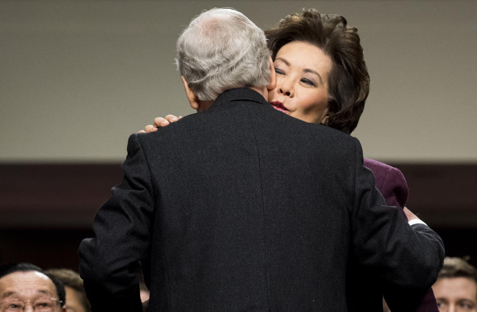 Secretary of Transportation nominee Elaine Chao gives her husband Senate Majority Leader Mitch McConnell, R-Ky., a kiss after introducing her during her Senate Commerce, Science and Transportation Committee confirmation hearing on Wednesday, Jan. 11, 2017. (Photo: Bill Clark/CQ Roll Call via Getty Images)