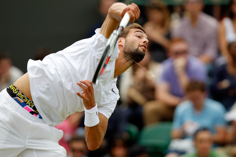 LONDON, ENGLAND - JUNE 30: Benoit Paire of France serves during his Gentlemen's Singles third round match against Brian Baker the USA on day six of the Wimbledon Lawn Tennis Championships at the All England Lawn Tennis and Croquet Club at Wimbledon on June 30, 2012 in London, England. (Photo by Paul Gilham/Getty Images)