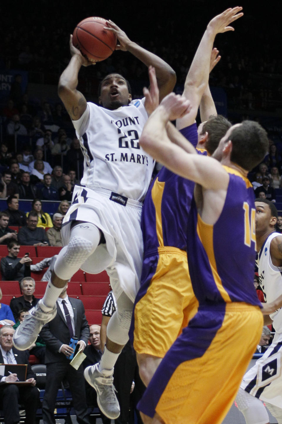 Mount St. Mary's guard Rashad Whack (22) drives against Albany in the first half of a first-round game of the NCAA college basketball tournament, Tuesday, March 18, 2014, in Dayton, Ohio. (AP Photo/Skip Peterson)