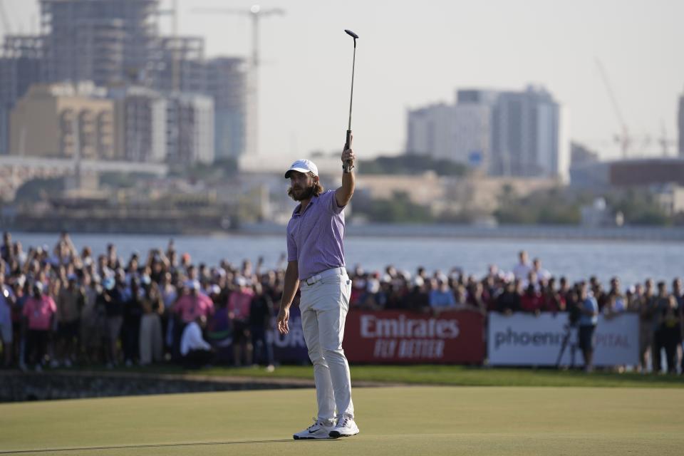 Tommy Fleetwood of England celebrates after he won the final round of Dubai Invitational golf tournament, in Dubai, United Arab Emirates, Sunday, Jan. 14, 2024. (AP Photo/Kamran Jebreili)