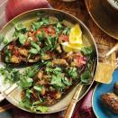 <p>The name of this seductive dish, Imam Bayildi, means ‘The Priest Fainted’ – most likely at the richness of it!</p><p><strong>Recipe: <a href="https://www.goodhousekeeping.com/uk/food/recipes/a536990/stuffed-aubergines/" rel="nofollow noopener" target="_blank" data-ylk="slk:Stuffed Aubergines;elm:context_link;itc:0;sec:content-canvas" class="link ">Stuffed Aubergines</a></strong></p>