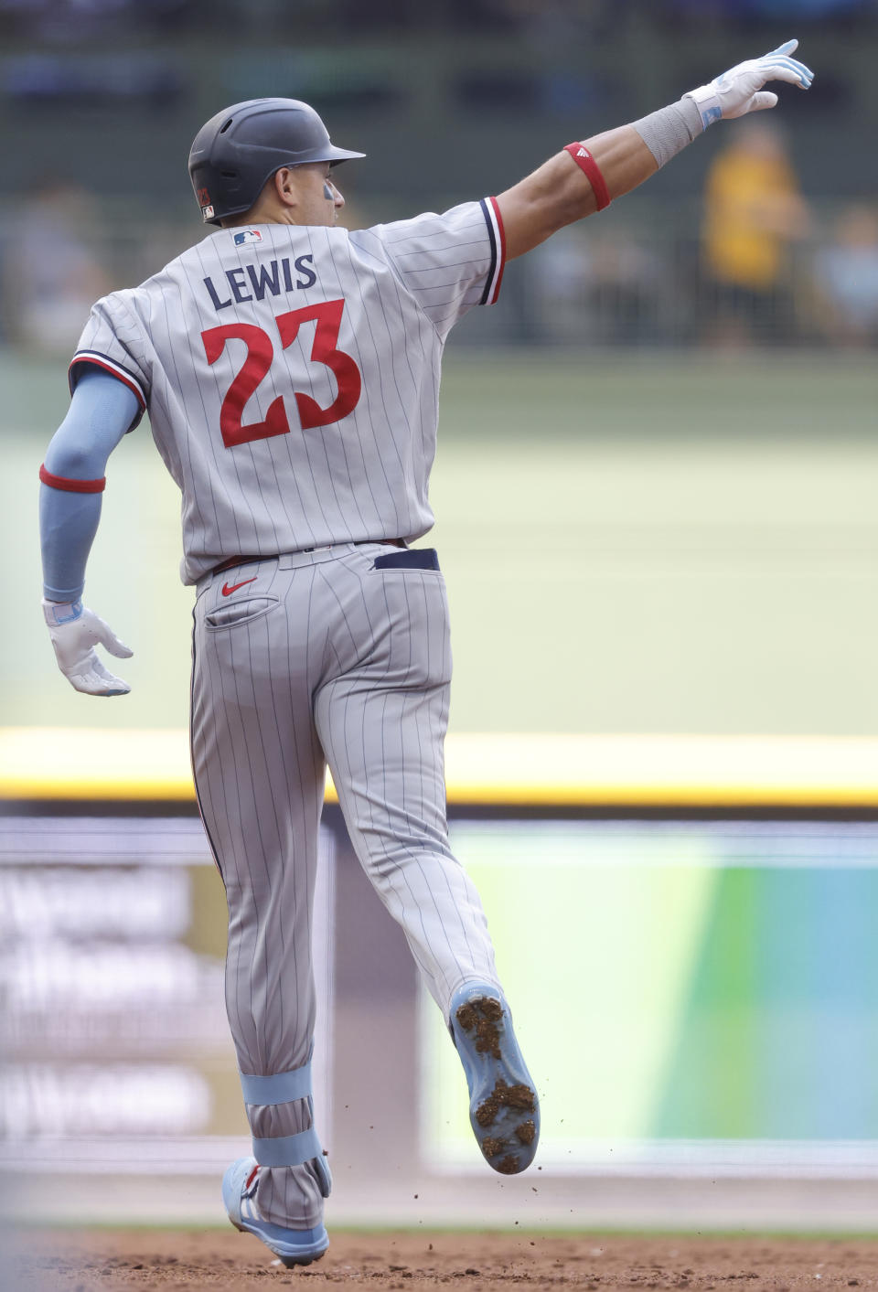 Minnesota Twins' Royce Lewis reacts to his two-run home run against the Milwaukee Brewers during the third inning of a baseball game Wednesday, Aug 23, 2023, in Milwaukee. (AP Photo/Jeffrey Phelps)