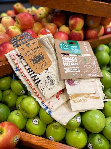 Outpost Natural Foods offers compostable plastic produce bags, which can be
composted at home, and it also has these reusable options for sale.