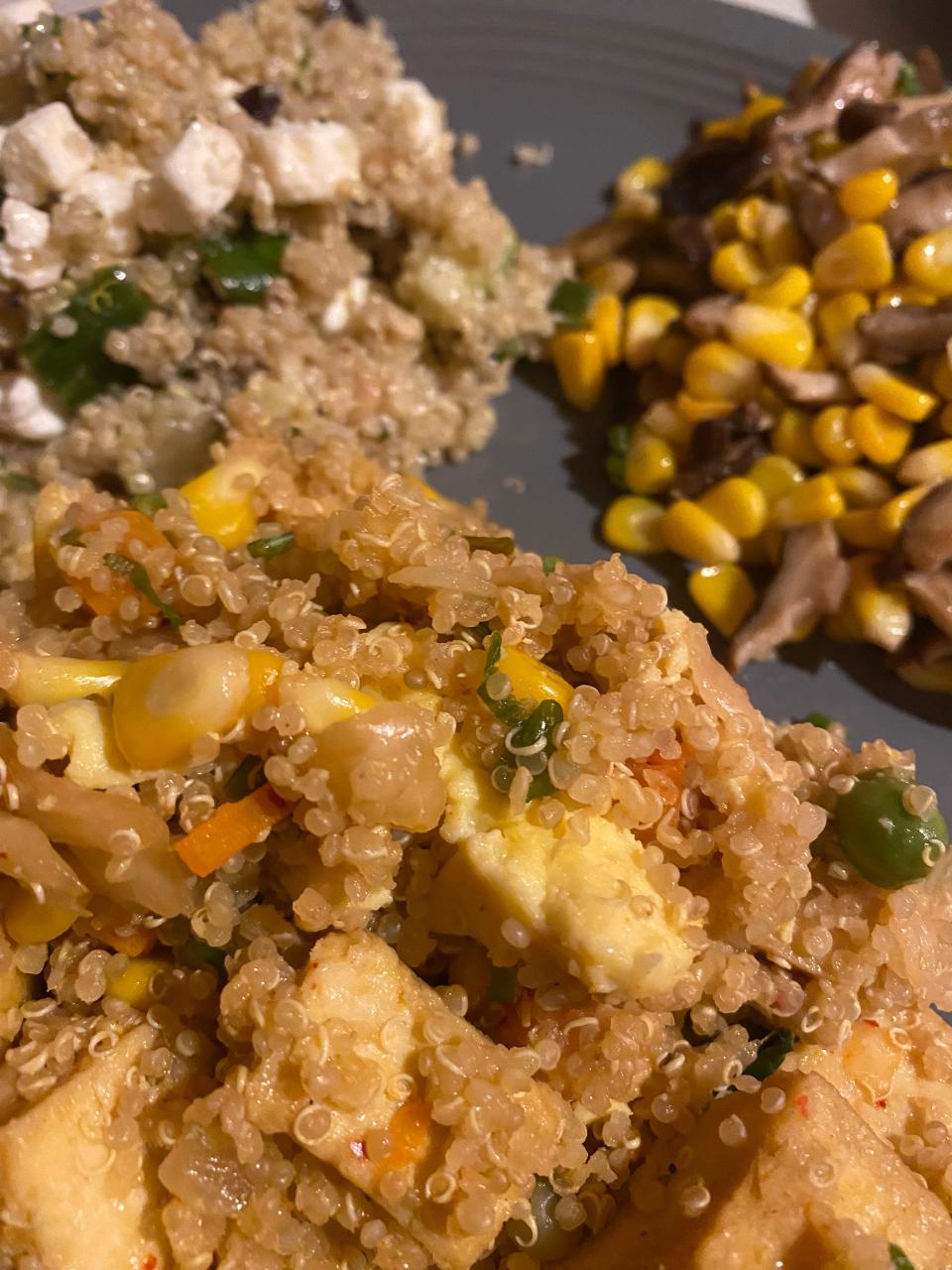 Quinoa kimchi fried rice, Greek quinoa salad, sautéed corn with shiitake mushrooms, from Feast & Fettle, East Avenue, Pawtucket.