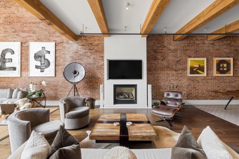 Exposed brick is part of the charm. Courtesy of Evan Joseph/Douglas Elliman