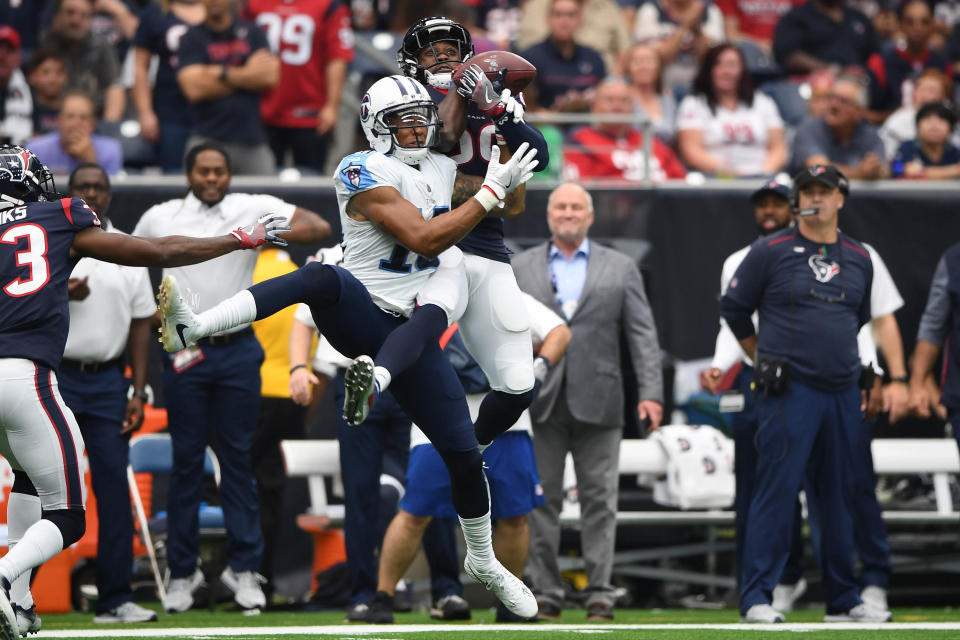 <p>Houston Texans free safety Andre Hal (29) intercepts a pass intended for Tennessee Titans wide receiver Rishard Matthews (18) during the second quarter at NRG Stadium. Mandatory Credit: Shanna Lockwood-USA TODAY Sports </p>