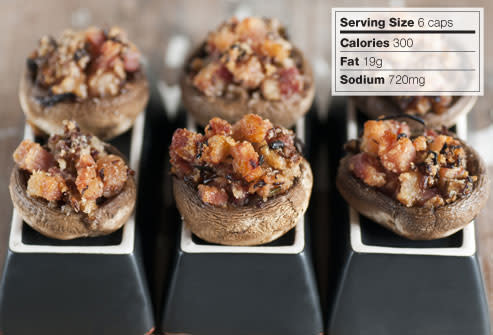 <div class="caption-credit"> Photo by: getty</div><b>BEST: Stuffed Mushrooms</b> <br> Stuffing mushrooms instead of potato skins helps keep the portion size down. Mushroom caps filled with cheese and breadcrumbs have less than 50 calories each. That means you can eat half a dozen and still keep your appetizer under 300 calories, along with 19 grams of fat, and 720 mg of sodium.