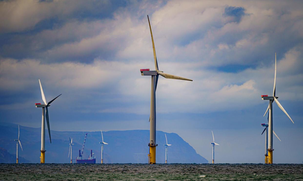 <span>Gwynt y Mor, the world's second-largest offshore wind farm, eight miles offshore in Liverpool Bay. Labour plans to turn the UK into a ‘clean energy superpower’.</span><span>Photograph: Ben Birchall/PA</span>