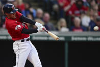 Cleveland Guardians' Myles Straw hits a double during the fourth inning of a baseball game against the St. Louis Cardinals, Saturday, May 27, 2023, in Cleveland. (AP Photo/David Dermer)